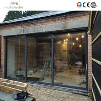 Porte coulissante élégante en aluminium de 22 mm avec verre insonorisé, installation sur rail encastré, isolation thermique moderne, extérieur et intérieur