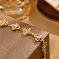 Bracelets à claquer et à clipser Ganku pour femmes, motif trèfle à quatre feuilles en zircone – Bijoux de fête tendance en gros