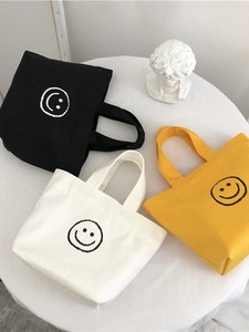 Nouveau sac fourre-tout en toile avec motif visage souriant, simple, polyvalent, artistique, jeune, sac à déjeuner pour femme, usage quotidien - Product Image 2