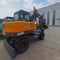 Excavatrice sur pneus d'occasion en bon état XINYUAN 75, 7 tonnes, faible nombre d'heures, prête à être expédiée, en stock