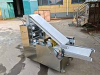 Machine automatique XINAO pour la formation de pâte pour pains vapeur, naan indiens, crêpes et gâteaux au sésame avec moteur (capacité 500 kg/h)