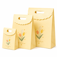 Sac en papier blanc personnalisé OEM avec logo imprimé offset, gaufrage, estampage à chaud et service d'emballage haut de gamme