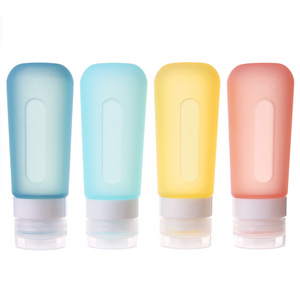 <b>Silicone</b> Travel Bottles Set of 4 Colorful Collapsible Containers with White Caps for Toiletries and <b>Liquids</b> - Product Image 1