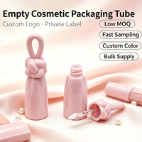 Tube de gloss à lèvres vide avec logo personnalisé, emballage cosmétique avec capuchon unique en forme de nœud pour la commercialisation de gloss à lèvres
