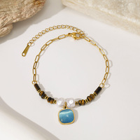 Bracelet en acier inoxydable plaqué or avec imitation perle œil de tigre, pendentif œil de chat bleu, chaîne trombone, bijoux pour femme, vente en gros, cadeau