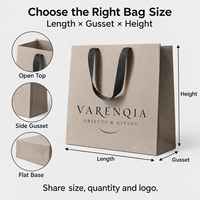 Sacs cadeaux de luxe en papier kraft avec poignées en ruban noir, logo personnalisé pour emballage de détail en boutique, commandes en gros pour les magasins de cadeaux
