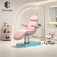 Lit de massage esthétique de luxe moderne en cuir PU avec base inclinable à 3 moteurs en acier inoxydable pour usage hôtelier