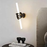 Lampes de table en résine LED noires en forme de main, style nordique moderne minimaliste, pour hôtels et salons, vente en gros et personnalisation