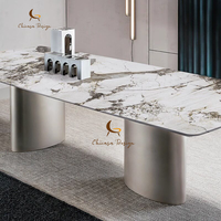 Ensemble de table à manger et table basse de restaurant en acier inoxydable avec plateau en marbre, design moderne et luxueux