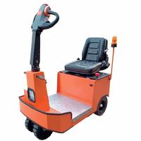 Tracteur électrique à trois roues, type utilitaire, avec chariot de remorquage assis, capacité de 1,5 tonne, mode marche debout