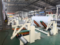 Machine industrielle automatique de rembobinage de papier toilette en rouleaux jumbo pour la fabrication à grande échelle