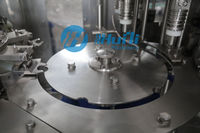 Ligne de production automatique de mise en bouteille d'eau gazeuse 3 en 1
