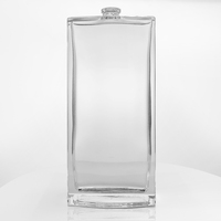 Flacon de parfum en verre rectangulaire transparent de luxe personnalisé de 200 ml avec une forme unique et un joli bouchon en acrylique