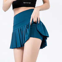 Mini robe de tennis d'été à la mode pour femmes Sportswear Jupes plissées sexy personnalisées en gros en vêtements de tennis pour filles en noir et blanc