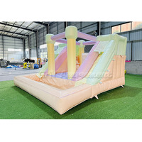 Château sautant coloré pastel en PVC Maison gonflable Maison gonflable avec double toboggan pour location de fête d'enfants
