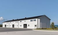 Entrepôts et hangars industriels préfabriqués en acier avec un design moderne pour usage commercial
