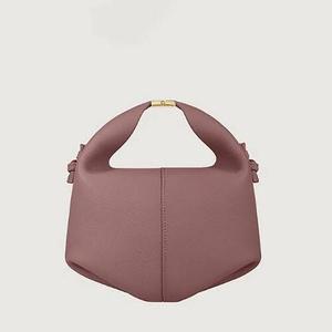 Sac à main élégant en similicuir avec accent pompon, fermeture éclair sécurisée, compartiment principal spacieux, sac à main élégant pour femmes - Product Image 1
