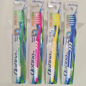 hot sale adult color handle two-color bristle massage plastic injection rubber toothbrush