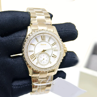 Montre de luxe pour femme MKOriginals en nacre, avec lunette en cristal festonné, sous-cadran, boîtier serti de diamants, étanche, chronographe doré
