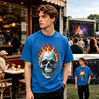 T-shirt surdimensionné bleu délavé personnalisé avec imprimé crâne et flammes, accents en strass/diamants, style streetwear américain/grunge