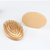 Peigne de massage en bois de hêtre à marque privée avec masseur de cuir chevelu, brosse à cheveux ovale portable à coussin d'air avec aiguilles en bambou et acier, mini-airbag