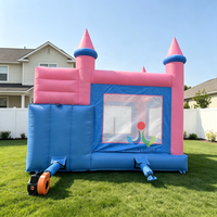Château gonflable géant rose et bleu pour événements commerciaux, conforme à la norme EN14960, pour stimuler les revenus de location d'équipements événementiels en extérieur