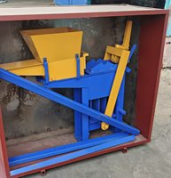 Machine à fabriquer des briques en argile Shengya à vendre au Zimbabwe QMR2-40, machine manuelle à blocs creux emboîtables facile à utiliser