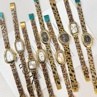 Nouvelle montre pour femme, cadran ovale, imprimé léopard, bracelet en alliage, montre-bracelet à quartz tendance, vente en gros
