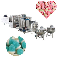 Ligne de production de bonbons entièrement automatique de grande capacité pour la confection de caramel traitement des éclairs de lait