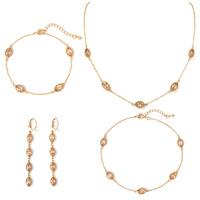 Parure de bijoux élégante en acier inoxydable pour femme : collier, bracelet et boucles d'oreilles à pampilles en zircon marquise – Idéale pour les soirées