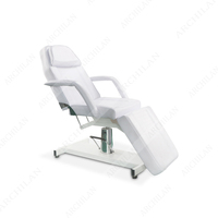 Lit de beauté pliable moderne en cuir véritable hydraulique personnalisable, éponge haute densité, utilisation en salon, clinique, ou à domicile, capacité 150 kg
