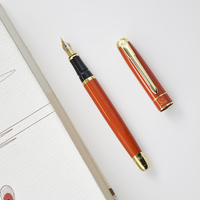 Achats en ligne Produits du Canada Vente en gros Couleur orange Stylo plume personnalisé élégant en acier Moins de 50