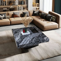 Table basse en travertin noir de luxe nordique avec acier inoxydable - Meuble essentiel chic pour le salon contemporain