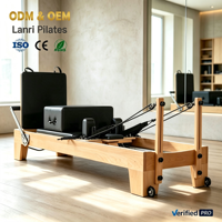 Reformer Pilates en bois de hêtre à rail lisse, lit d'entraînement commercial pour salle de sport avec ressorts réglables