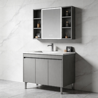 Meuble-lavabo mural pour salle de bain avec pieds métalliques surélevés, support robuste, design flottant, nettoyage facile, armoire avec miroir et rangement