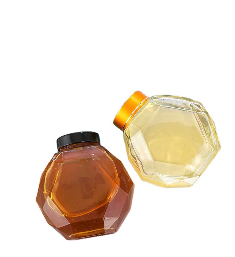 有竞争力的热门产品透明新颖蜜罐玻璃蜂蜜六角玻璃罐,带黑色盖子