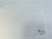 Tissu d'interlining non tissé sans UV PES/PA Microdot sans poudre fluorescente pour la confection de vêtements