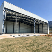 Hangar d'avion préfabriqué à grande portée en structure métallique, assemblage rapide, protection incendie, construction durable, résistant à l'usure