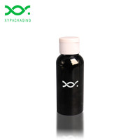Xypackaging Flacon rond en PET plastique de luxe de 50 ml avec bouchon à bille pour les soins de la peau et les cosmétiques