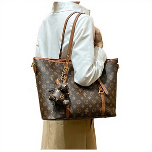 Sacs à main unisexes en cuir véritable de luxe, forme oreiller, version Louis, logo personnalisé, sacs de créateurs de haute qualité de Hong Kong - Product Image 2