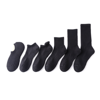 Chaussettes de sport en gros pour hommes, montantes jusqu'au genou, épaisses, élastiques, à compression, en coton et élasthanne, noires, pour la course en extérieur et le volleyball
