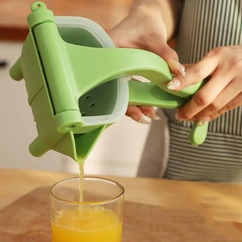 Wholesale High Quality Handheld Portable Use fruit Extractor Hand Press Lemon juice press Orange Maker Plastic Squeezer Manual