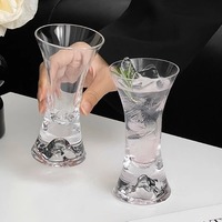 Verre à pied haut de gamme pour jus, champagne, cocktails et boissons froides, avec vue panoramique