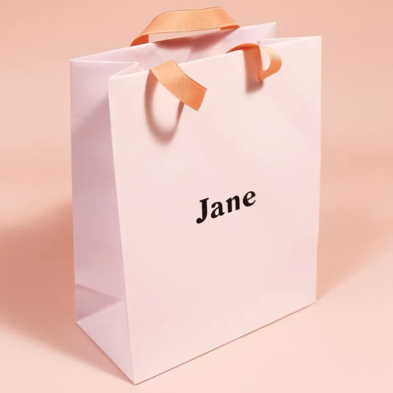Sacchetto di carta regalo riutilizzabile all'ingrosso stampa personalizzata di lusso sacchetto di carta da imballaggio a mano sacchetto di carta personalizzato di lusso