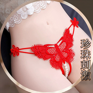 Lingerie féminine Lemon Story, culotte string sexy taille basse en dentelle rouge avec perles massantes - Product Image 1