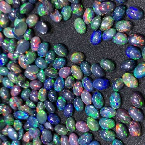 Ópalo Negro Natural Etíope en Piedra Suelta con Forma de Huevo, Buen Fuego de Color, Base Plana y Superficie Lisa Tratado Térmicamente - Product Image 3