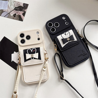 Étui de téléphone élégant avec porte-cartes en relief en forme de cœur et nœud pour iPhone 18 17 Pro Max 16 15 14 13, avec sangle bandoulière et protection portefeuille