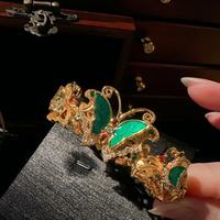 Bracelet jonc de soirée pour femme, design personnalisé, haut de gamme, style vintage, avec fleurs en émail doré et cristaux, bijou de déclaration