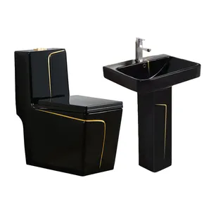 Salle de bain de luxe carrée moderne, montage au sol, articles sanitaires wc commode cuvette de toilette une pièce en céramique, toilette noire avec ligne d'or