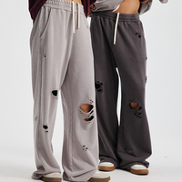 Pantalon de survêtement OEM vintage en molleton bouclette avec broderie de patchs, délavage acide et effet usé, coupe droite ample pour homme